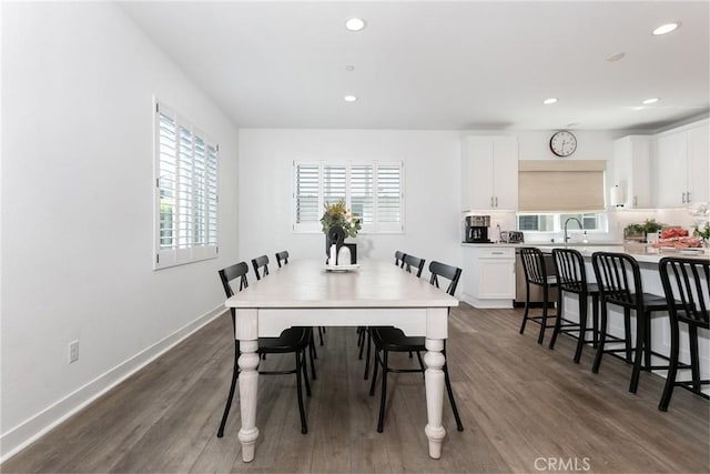 dining room featuring recessed lighting, baseboards, and dark wood-style flooring