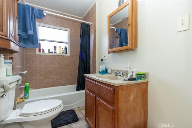 bathroom with tile patterned floors, shower / bath combination with curtain, toilet, and vanity