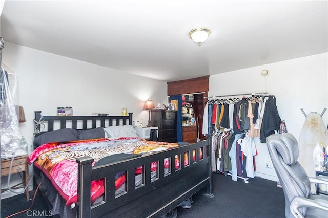 bedroom featuring carpet