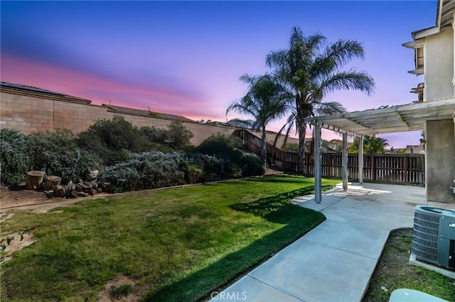 view of yard with a patio area, cooling unit, a fenced backyard, and a pergola