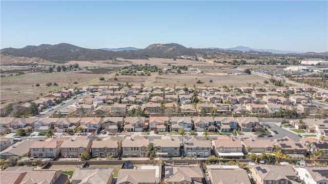 drone / aerial view featuring a mountain view and a residential view