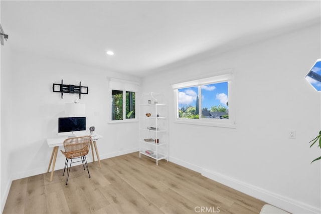 home office featuring recessed lighting, baseboards, and wood finished floors