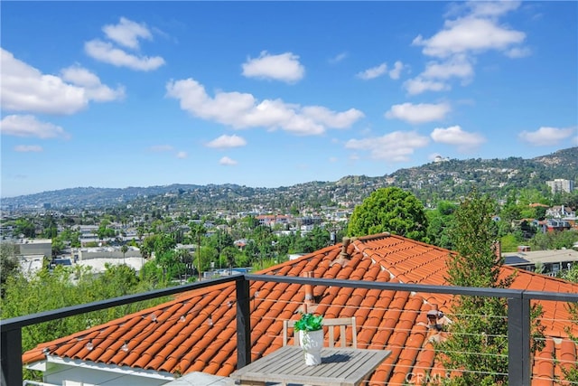 balcony featuring a mountain view