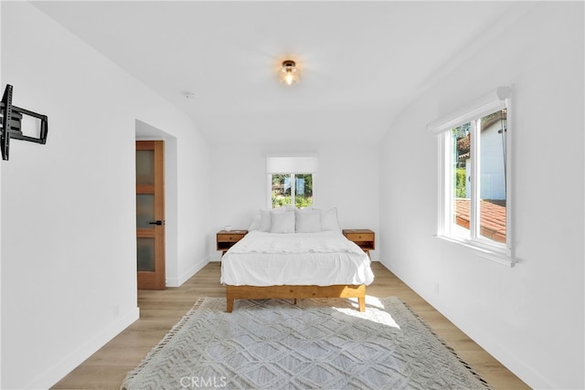 bedroom with light wood-type flooring