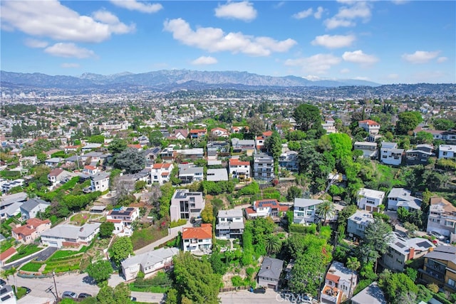 birds eye view of property featuring a residential view and a mountain view