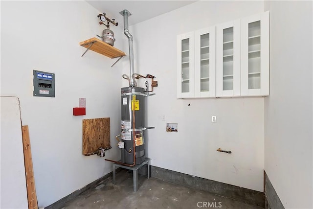 utility room with gas water heater