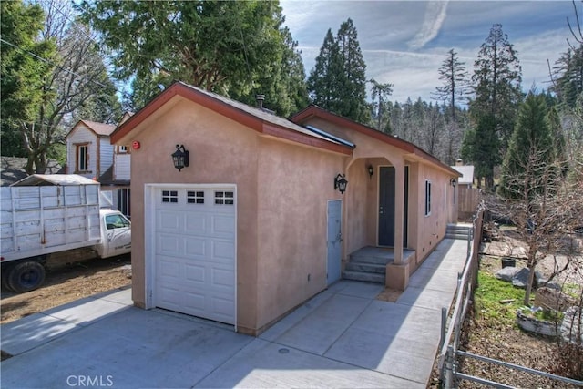 exterior space with concrete driveway