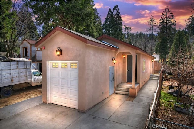 garage with driveway