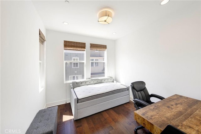 bedroom featuring recessed lighting, baseboards, and wood-type flooring