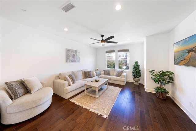 living room with a ceiling fan, dark wood-type flooring, recessed lighting, and visible vents