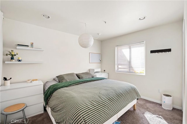 bedroom featuring recessed lighting, baseboards, and carpet