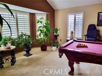 playroom with plenty of natural light, carpet flooring, billiards, and lofted ceiling