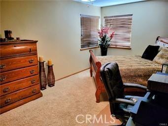 bedroom with carpet and ceiling fan