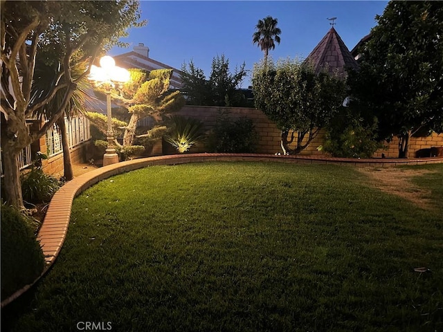 view of yard featuring fence