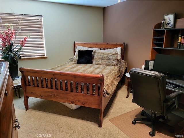 bedroom featuring carpet