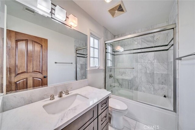 1425 Mirasol Dr, San Marino, CA 91108 - full bath featuring visible vents, vanity, toilet, and bath / shower combo with glass door
