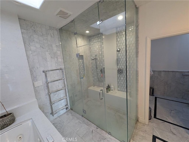 full bathroom featuring visible vents, marble finish floor, and a shower stall