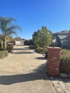 view of street featuring driveway