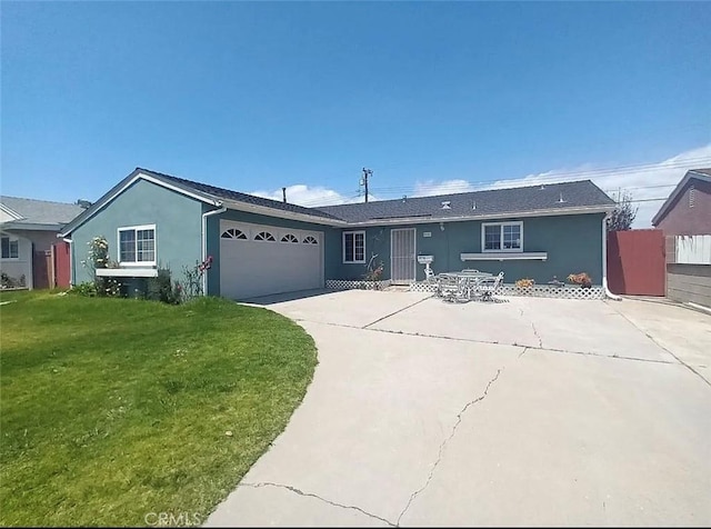 single story home with a front lawn, a garage, driveway, and stucco siding