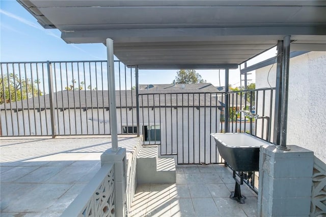 view of patio / terrace with a balcony