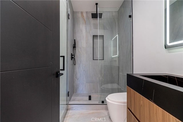 10943 Pickford Way, Culver City, CA 90230 - bathroom featuring toilet and a marble finish shower