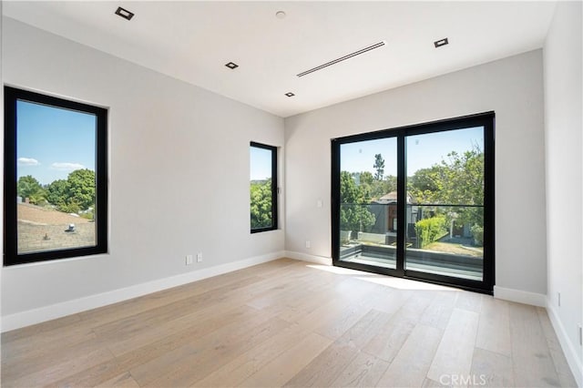 10943 Pickford Way, Culver City, CA 90230 - spare room featuring baseboards and light wood-style flooring