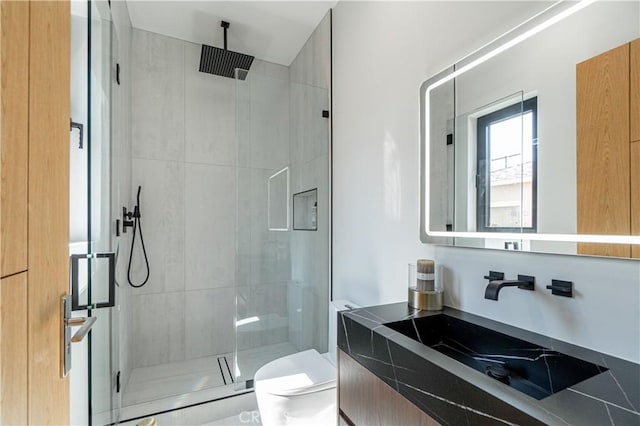 10943 Pickford Way, Culver City, CA 90230 - full bathroom featuring vanity, toilet, and a shower stall