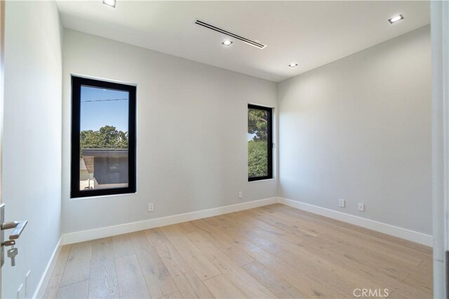 10943 Pickford Way, Culver City, CA 90230 - empty room featuring recessed lighting, baseboards, and light wood-style flooring