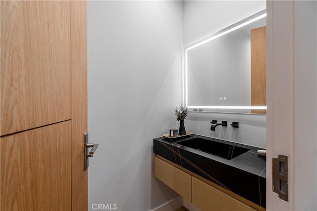 10943 Pickford Way, Culver City, CA 90230 - bathroom featuring vanity and baseboards