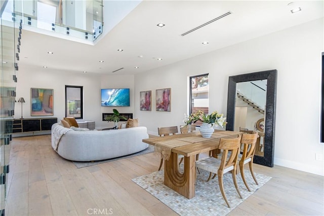 10943 Pickford Way, Culver City, CA 90230 - dining area with recessed lighting, baseboards, and light wood-type flooring