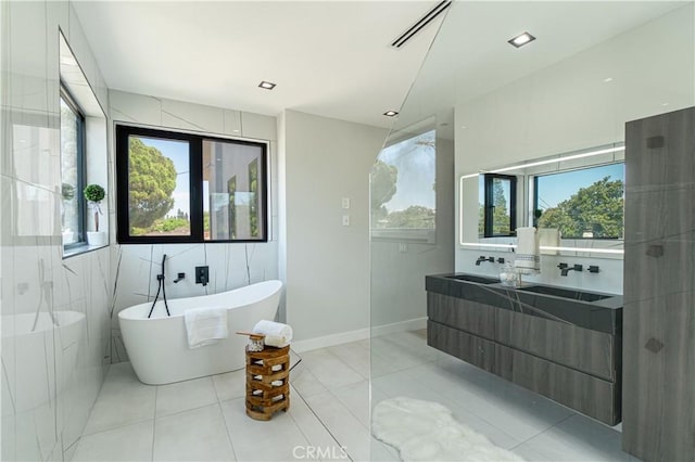 10943 Pickford Way, Culver City, CA 90230 - bathroom featuring vanity, tile patterned flooring, visible vents, and a soaking tub
