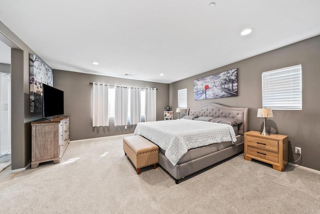 bedroom with recessed lighting, baseboards, and light colored carpet