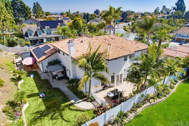 birds eye view of property with a residential view