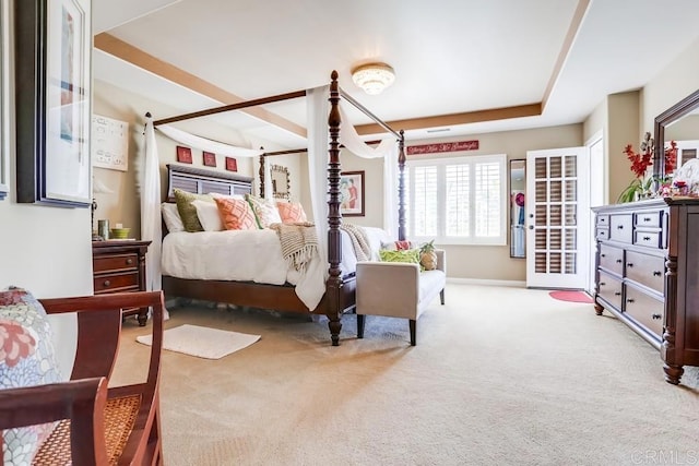 bedroom featuring baseboards and carpet flooring