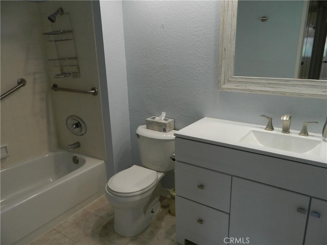 full bathroom with tile patterned floors, toilet, shower / tub combination, vanity, and a textured wall