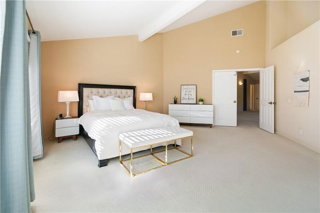 bedroom with lofted ceiling with beams, visible vents, and light carpet