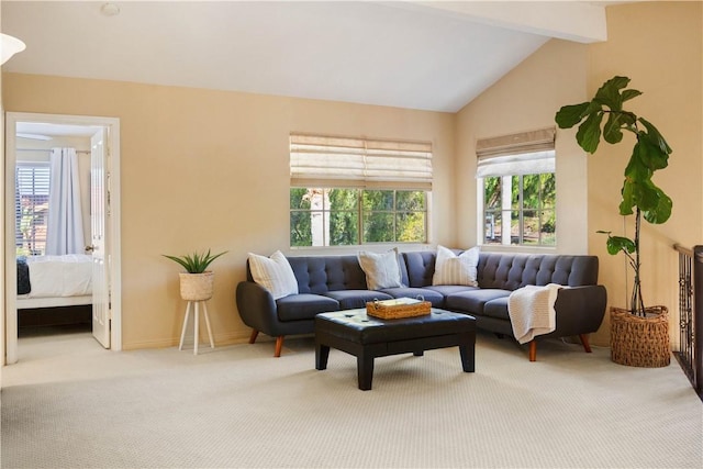 carpeted living room with baseboards and vaulted ceiling with beams