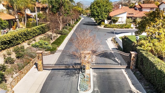 birds eye view of property with a residential view