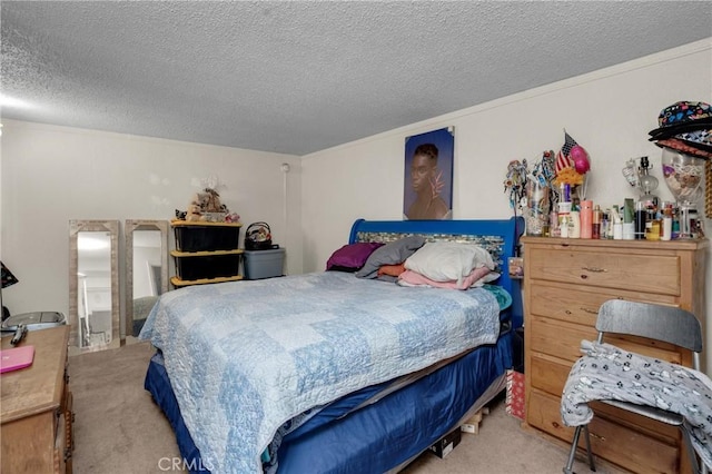 carpeted bedroom featuring a textured ceiling