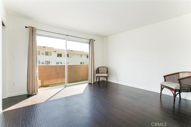 unfurnished room featuring wood finished floors