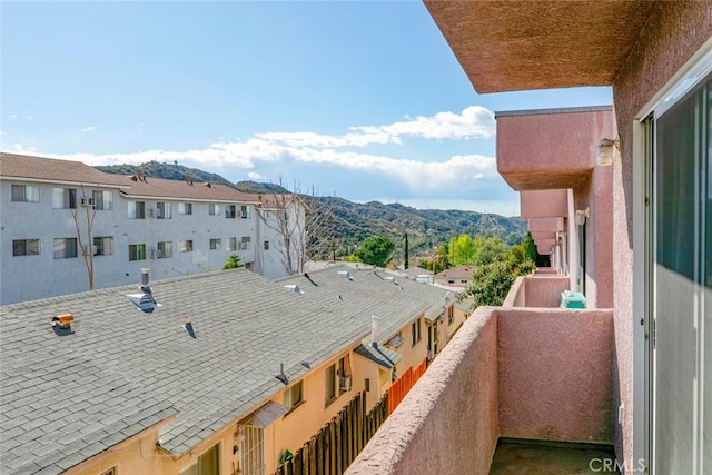 balcony featuring a mountain view