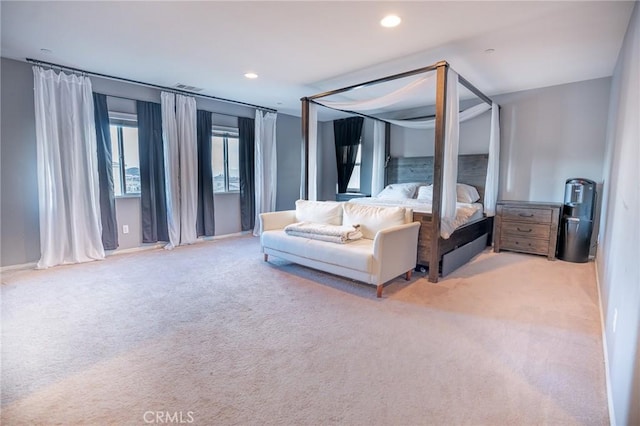 bedroom with recessed lighting, visible vents, and carpet floors