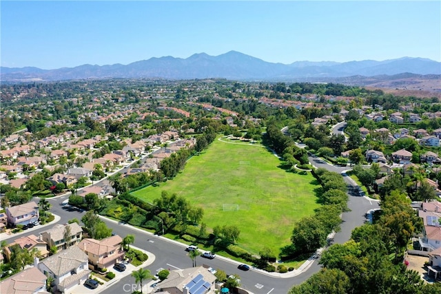 drone / aerial view with a residential view and a mountain view