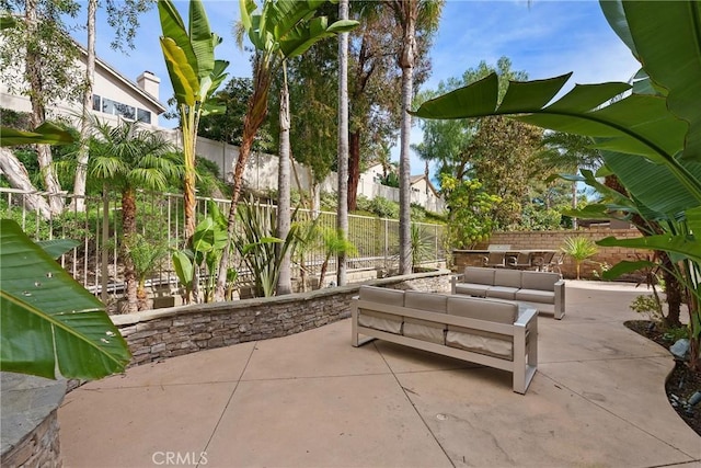 view of patio / terrace featuring a fenced backyard and outdoor lounge area