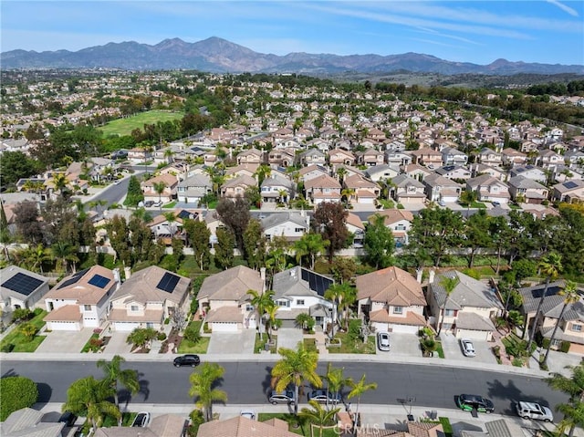 bird's eye view featuring a mountain view and a residential view