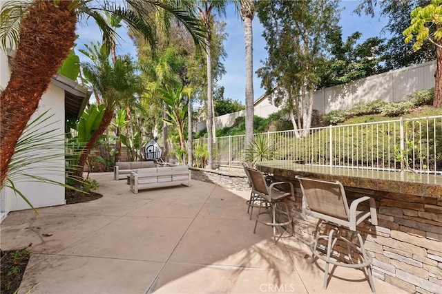 view of patio / terrace featuring a fenced backyard and outdoor lounge area