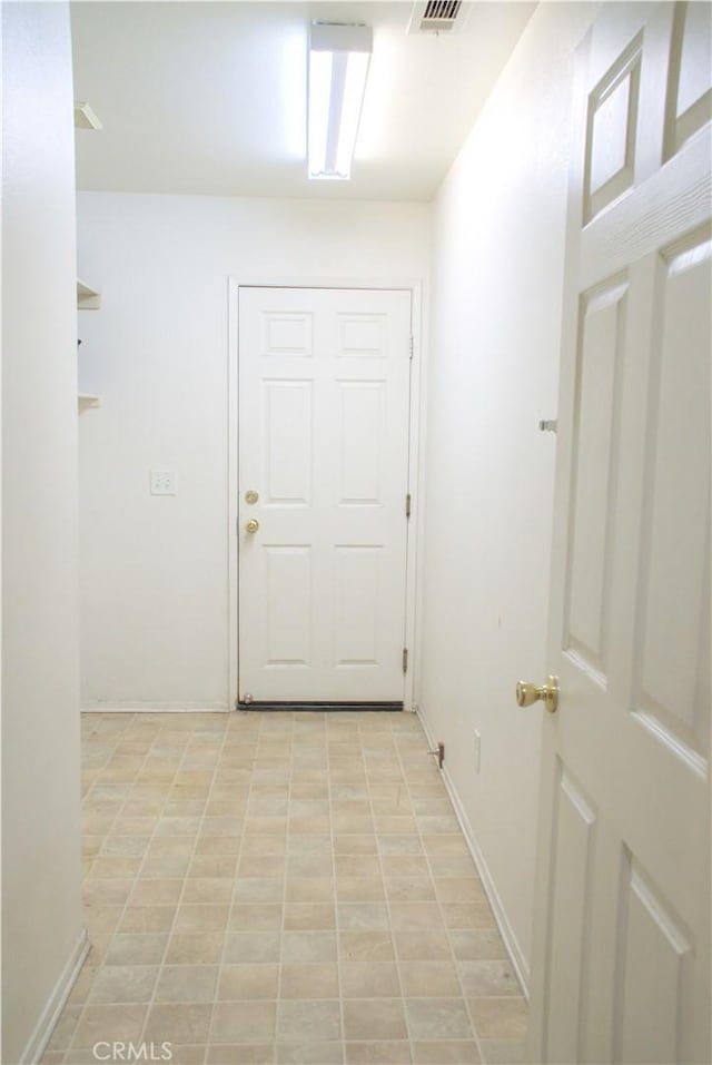 corridor with baseboards
