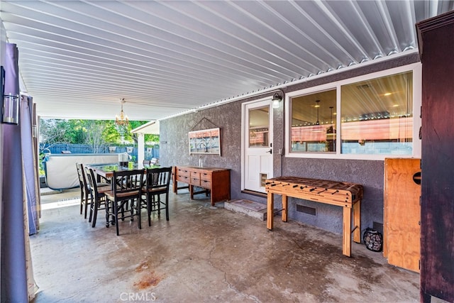 view of patio featuring outdoor dining space and fence