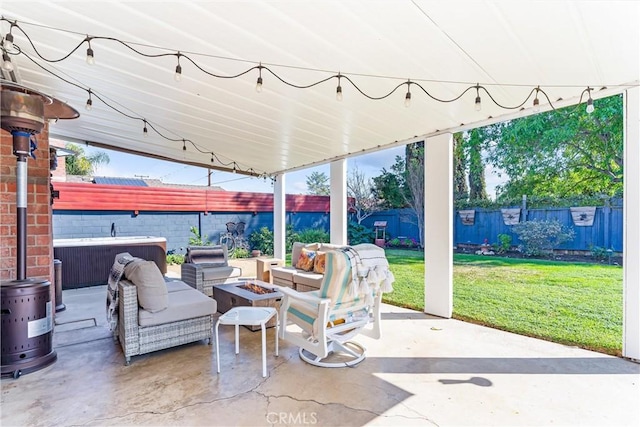 view of patio / terrace featuring an outdoor living space with a fire pit and a fenced backyard