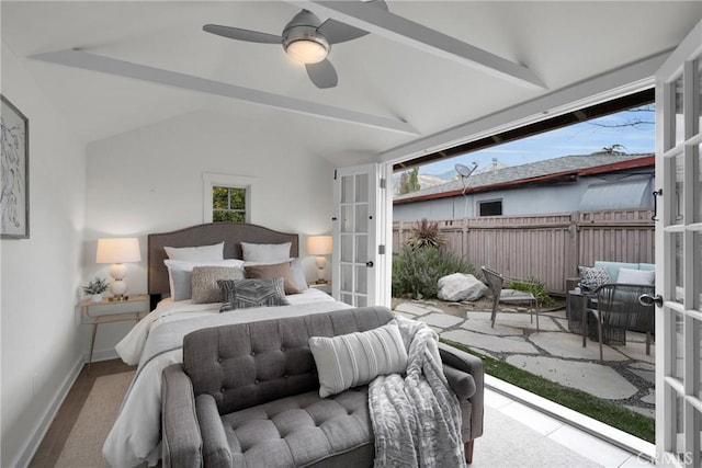 bedroom featuring lofted ceiling, access to outside, multiple windows, and french doors